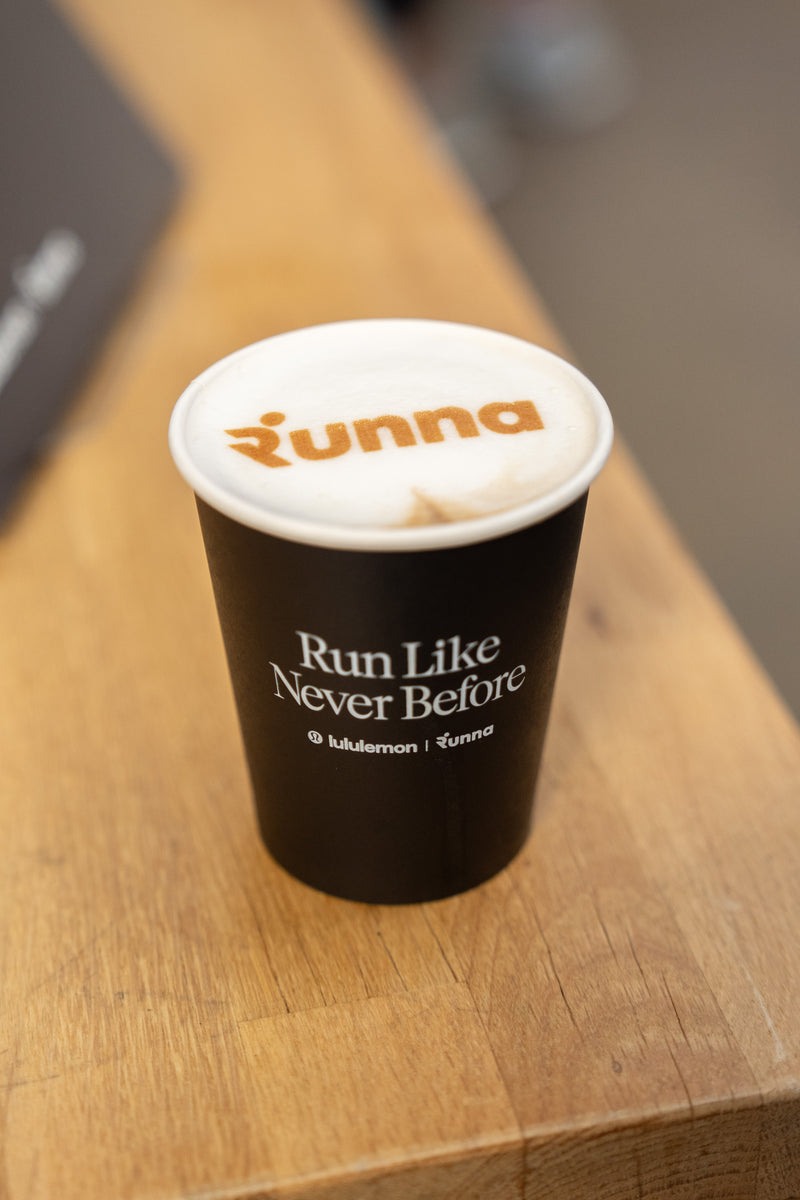 Runna logo printed onto coffee in a branded Runna and lululemon cup
